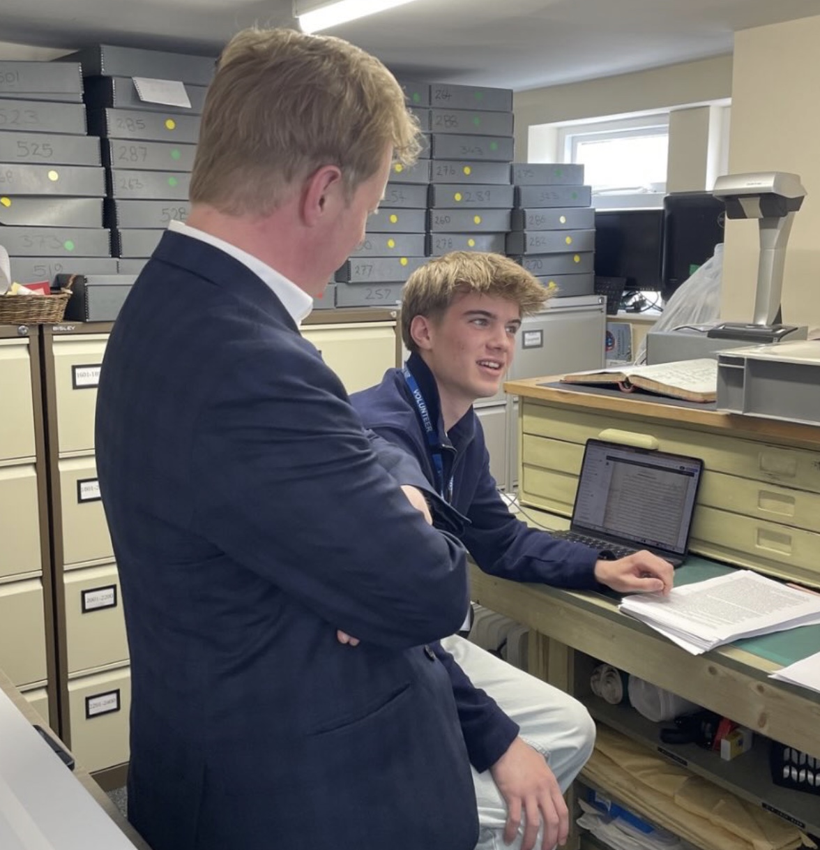 The founder of Umberdosh Restoration at work as an archivist at Chatteris Museum